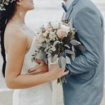 beautiful-beach-wedding-bride-and-groom-hugging-e-2022-12-15-23-57-32-utc.jpg